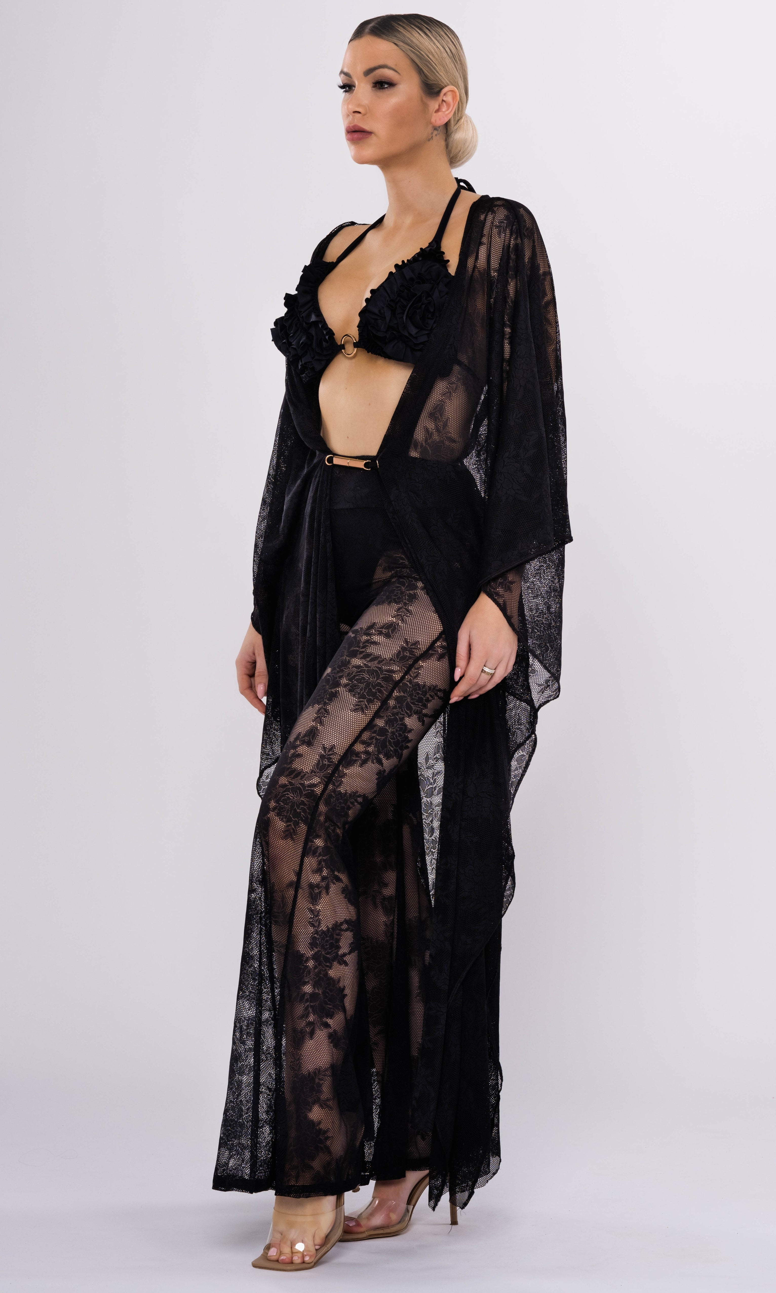 Antoninias Rose sustainable bikini top with luxurious ruffles and gold rings, crafted for upscale womenswear and designer resort swimwear.