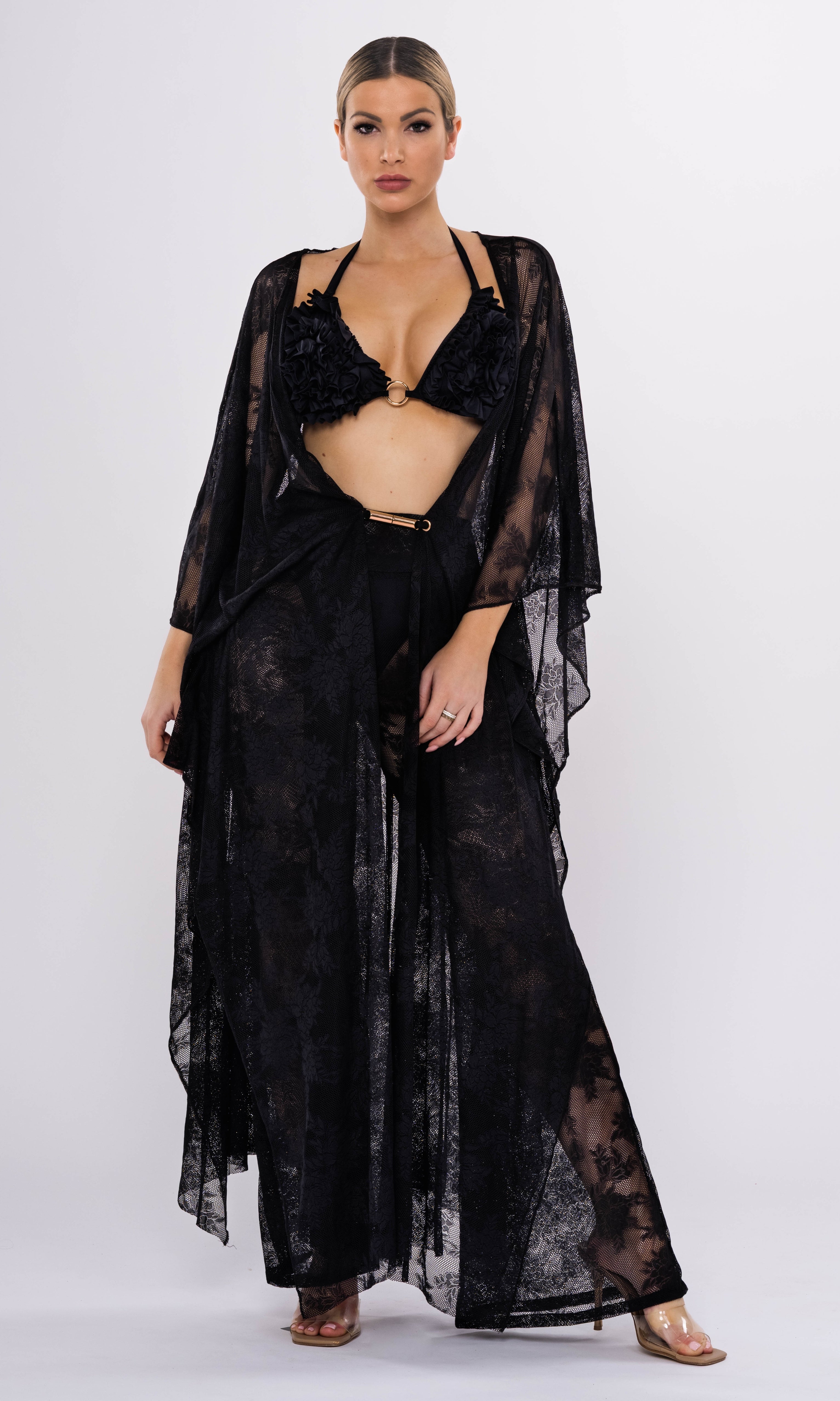 Antoninias Rose sustainable bikini top with luxurious ruffles and gold rings, crafted for upscale womenswear and designer resort swimwear.