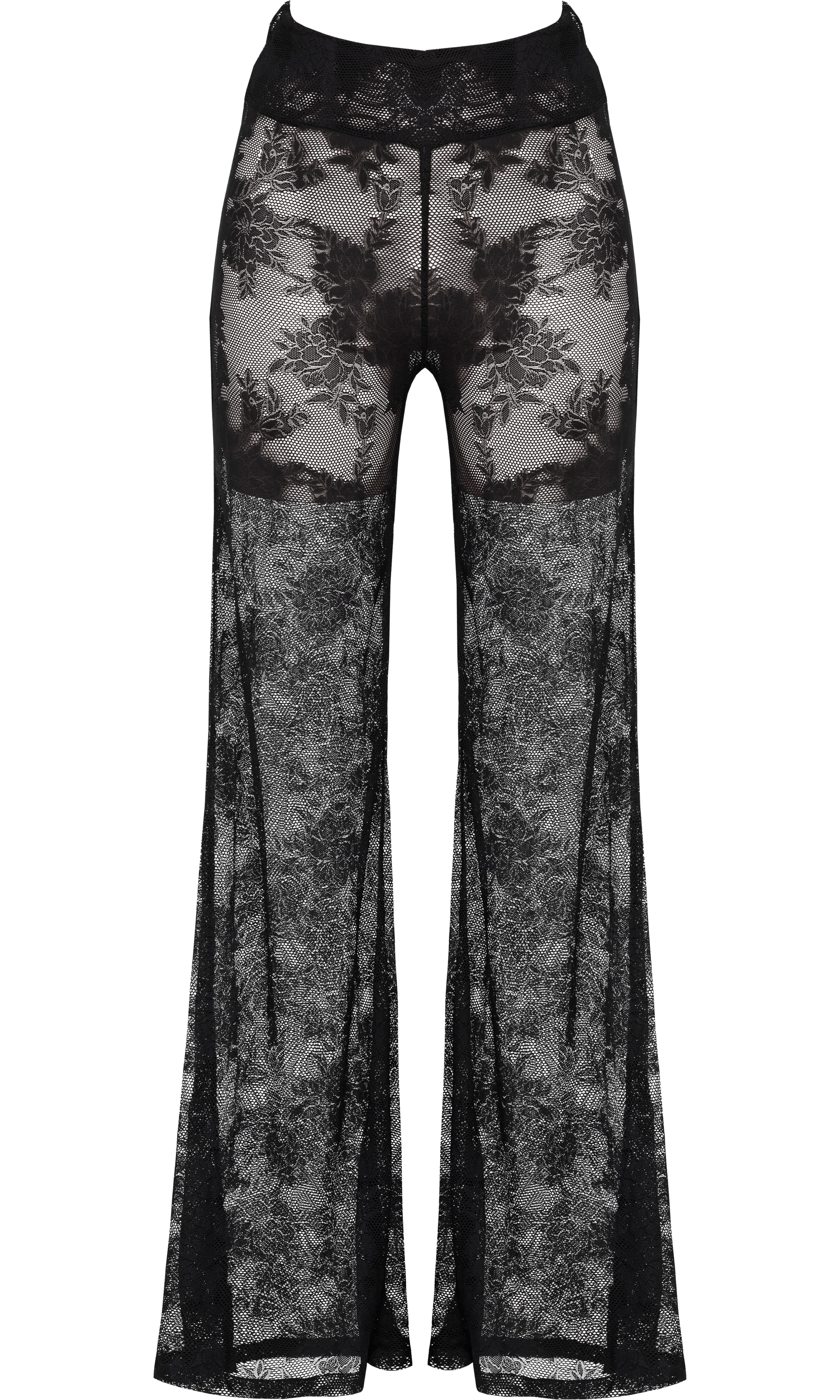 Model wearing Flora luxury sustainable sheer lace pants by Antoninias, designed with wide-leg silhouette and intricate floral detailing for premium resort wear and designer womenswear