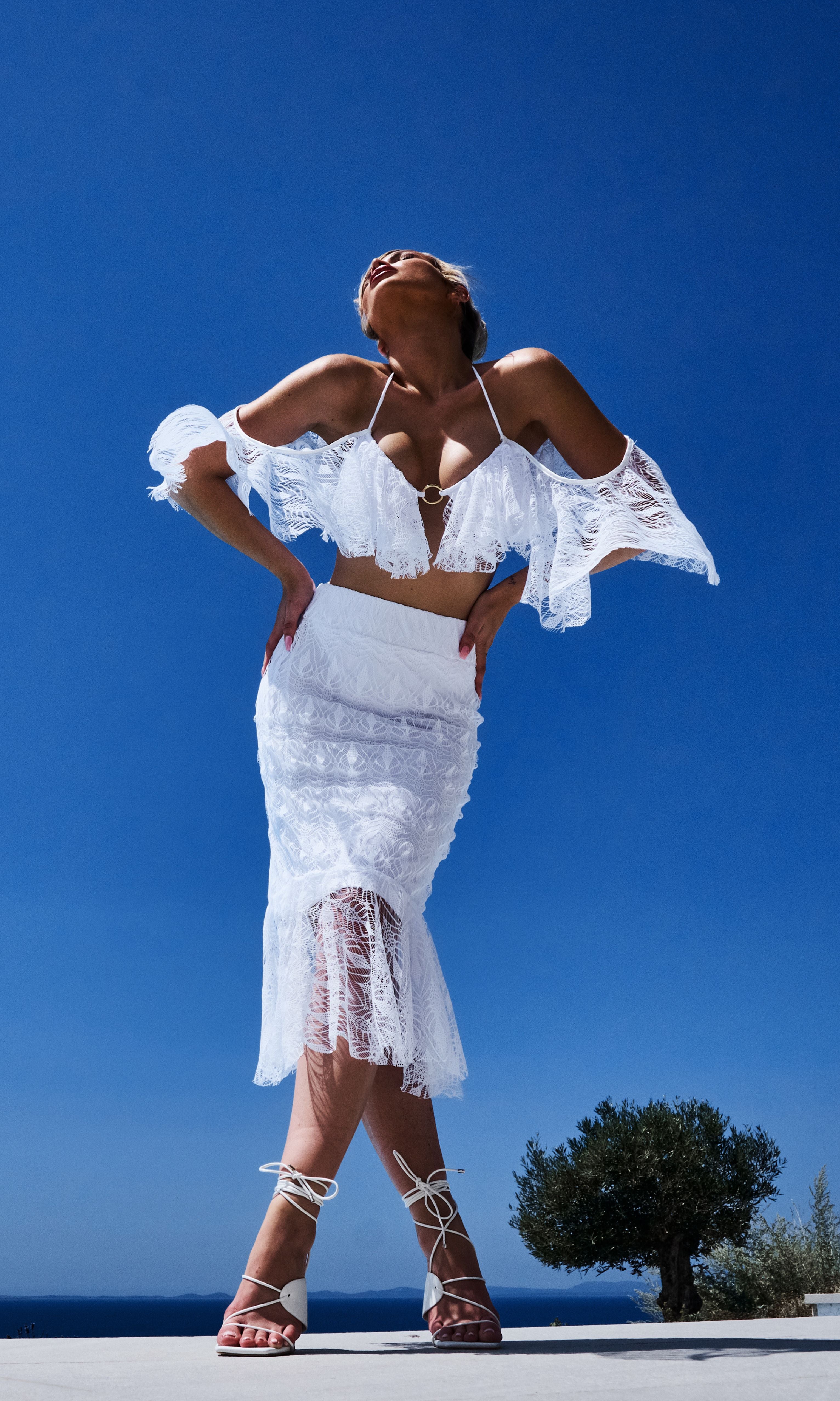Antoninias Cassia sustainable lace skirt designed with delicate embroidery and a fitted waistline, ideal for luxury resort collections and elegant beachwear.