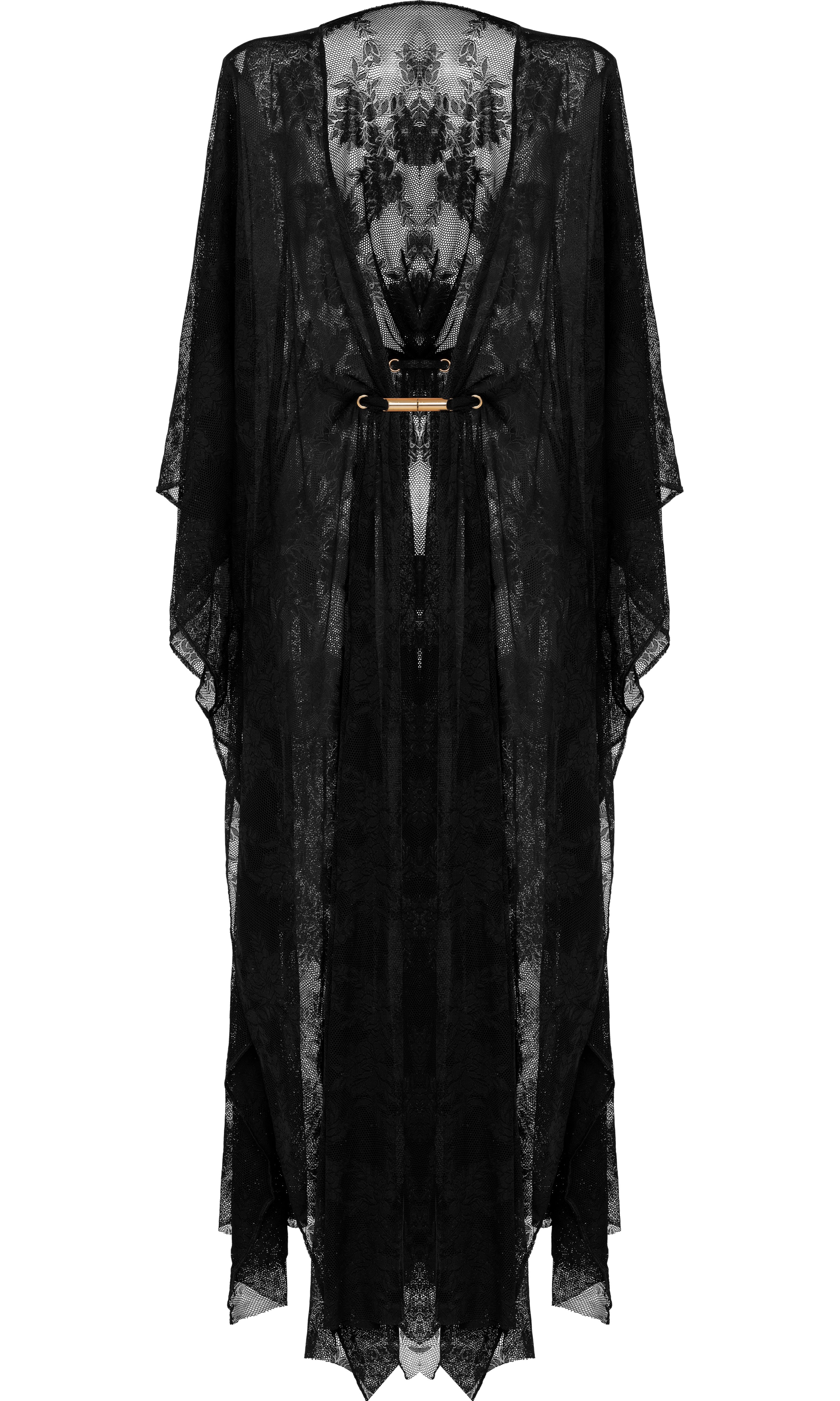 Luxury sustainable lace cover-up by Antoninias from the Flora collection, featuring sheer floral fabric, flowy silhouette, and a gold-tone belt, ideal for premium resort wear and designer womenswear.
